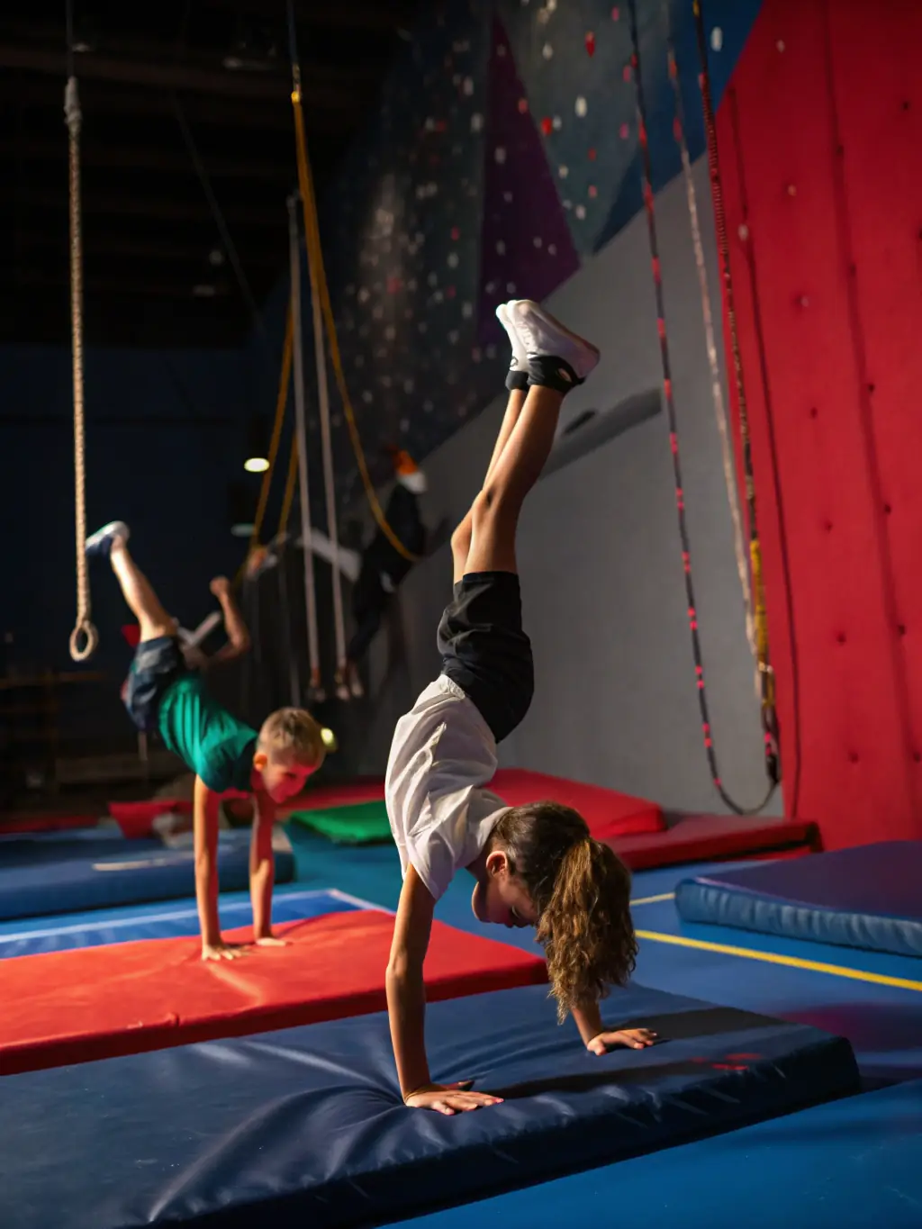 A community event with families participating in gymnastics-related activities, promoting health, teamwork, and community spirit at GYMNAST VOLONT AURILLAC NORD.